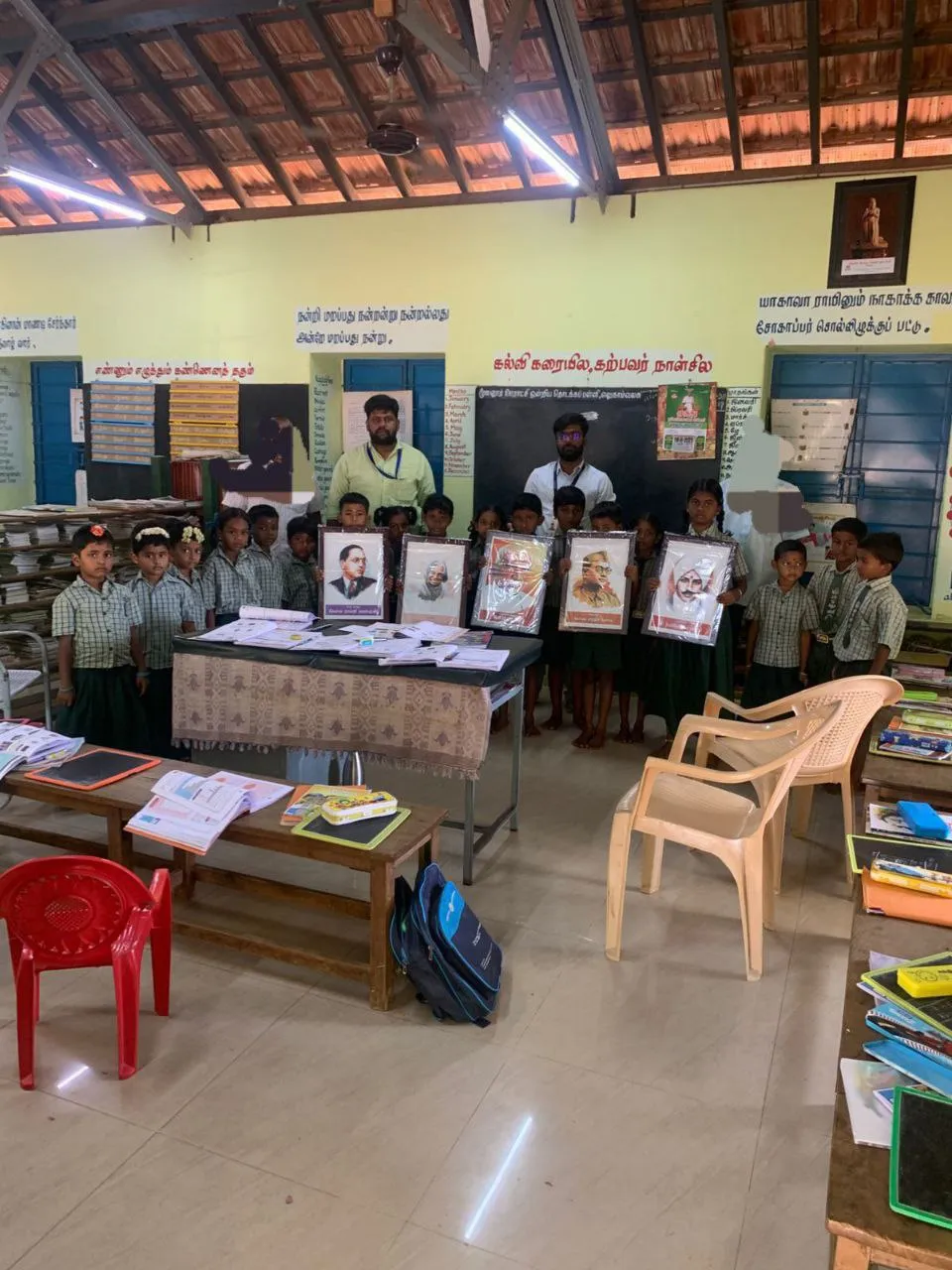 Students receiving educational supplies from Jaysel Chit Funds